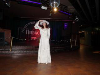 In Wedding Dress and White Hat on stage 15 of 20
