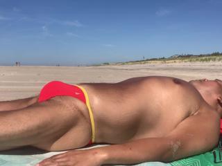 Watch me Sunbathe on the beach on Cherry Grove Fire Island