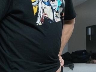 Wearing my kiss shirt and flexing my little muscle 1 of 8