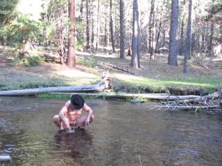 Naked bathing in the creek.