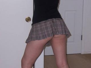 My hot 30 year old wife .... Short plaid skirt (Strip club) 2 of 9