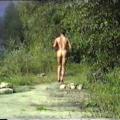BluttBoy naked at the river.