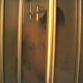 Yvonne takes a shower