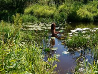 in a weedy pond 16 of 20
