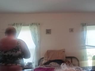 Trying on two  piece swimsuit