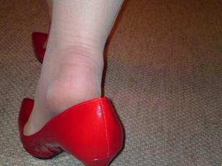 Her hot high heels in red 4 of 7