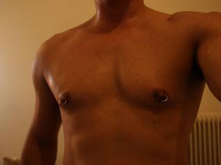 Freshly shaven and nipple rings 3 of 4