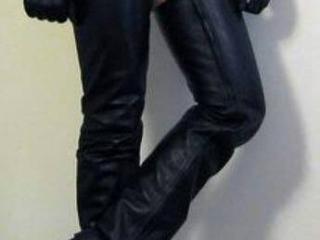 pictures of my leather outfit from the last 50 years . 4 of 5