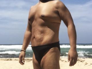 Orange thong and black speedo at the beach 6 of 9