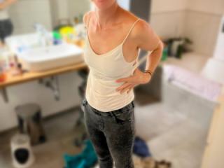 Hotwife flashes teenytitts 1 of 4