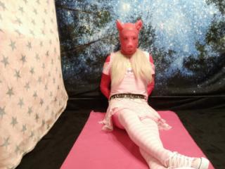 Sissy slave in pink dress and white tail 1 of 14