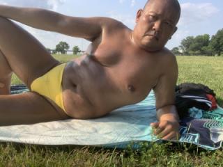 Sunbathing in Bayonne Park Yellow thong 7 of 16