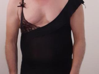 Sissy crossdresser wearing mini black dress 3 of 20