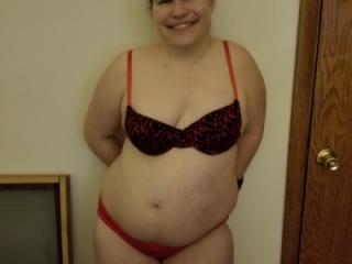 Cuffed in black/red bra and red panties 1 of 6
