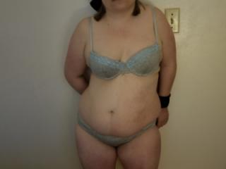 Playing in grey bra and panties 5 of 10