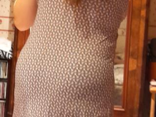 Eve puts on her new nightie 3 of 9