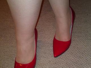 Her hot high heels in red 3 of 7