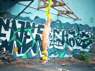 Naked guy suspended and whipped until orgasm