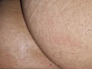 Teasing her tight asshole with a dildo