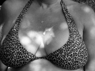 Big tits and hairy cunt in b and w 17 of 17