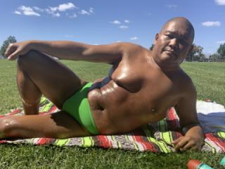 Sunbathing in my green bikini. Please TASTE me!!!