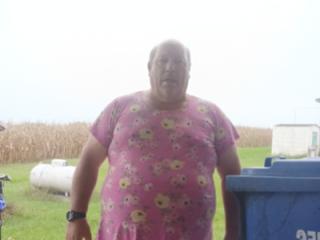 61old  in girls nightie  outside