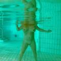 Petra naked in the public swimming po...